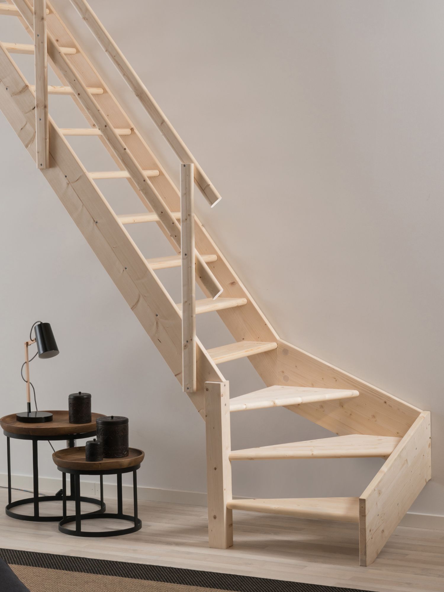 Space saving staircase DOLLE DALLAS in a photo studie with rustic Atmosphere